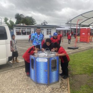 Octagon Hydration Station, with TWW blue bubble mural, installed at a school